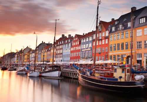 Colorful homes line Nyhavn Canal in Copenhagen, Denmark