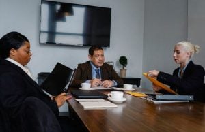 A business meeting conducted in Portuguese